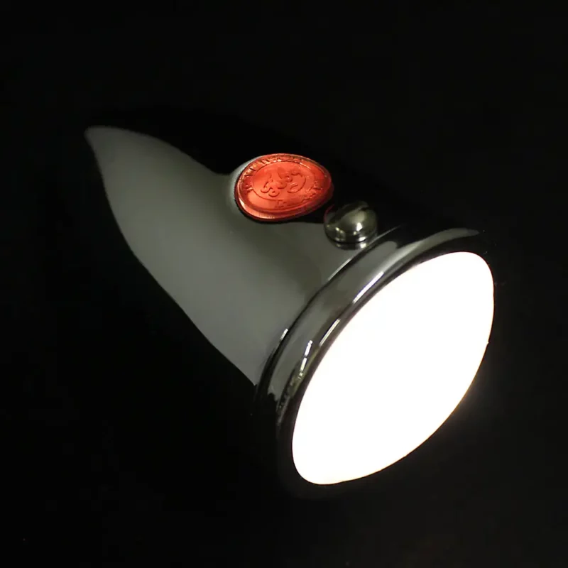 1130 streamlined wing light with red-dot lit at night